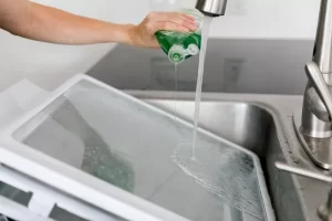 Washing refrigerator shelves 